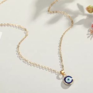 Collar ojo turco ojo azul y rosa minimalista con cadena dorada de aleación de zinc para mujer